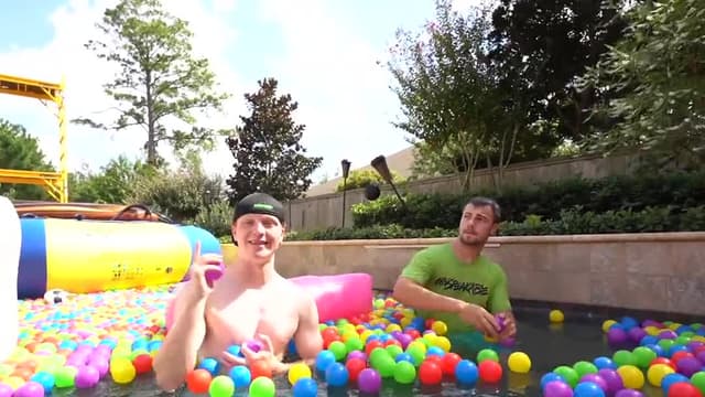 S01:E04 - The Biggest Backyard Water Slide Challenge / Last to Leave the Pool Wins $10,000!